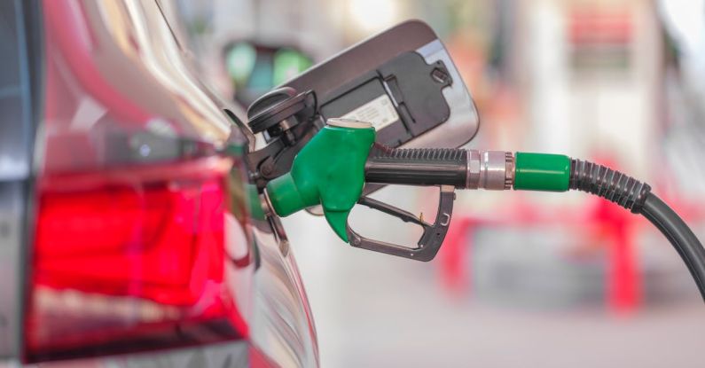 Fuel Efficiency - Pumping gas at gas pump