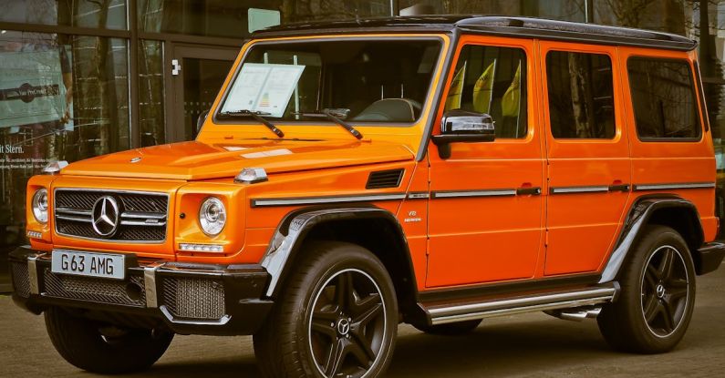 Truck Vs. SUV - Orange Mercedes Benz G63