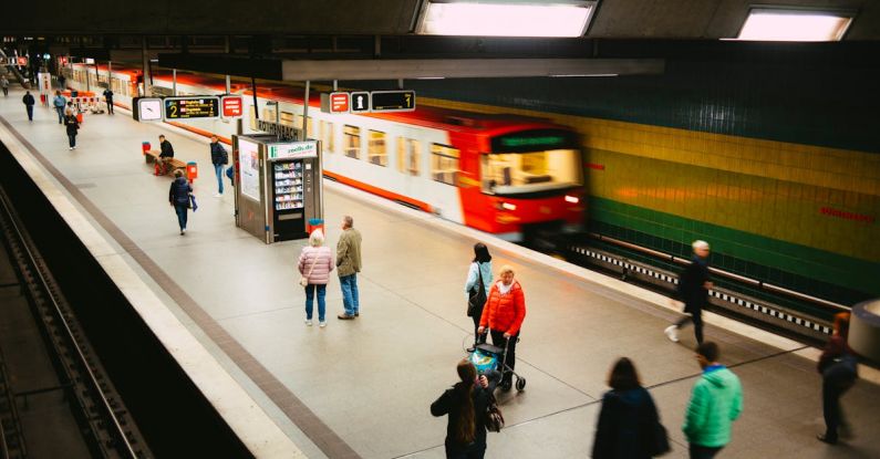 Urban Mobility - People Walking on Train Station